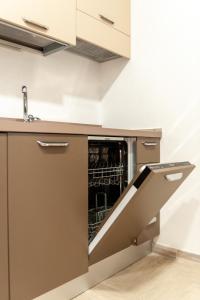A kitchen or kitchenette at DOMO ALLE