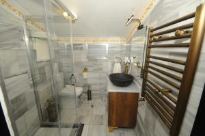 a bathroom with a sink and a shower at The Old Ottoman Castle in Istanbul +85 photos