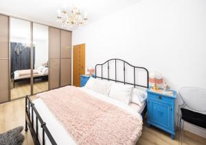 Postel nebo postele na pokoji v ubytování Silvie Apartments - Hejčín