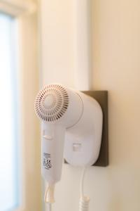 a hair dryer next to a hair dryer at HILLS RESORT Beach, Bungalows and Bar - Velika Plaza Ulcinj in Ulcinj