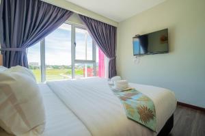 Postel nebo postele na pokoji v ubytování FLYPOD Hotel
