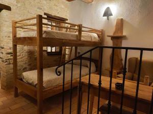 A bed or beds in a room at B&B I Martelli