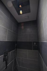 Koupelna v ubytování Appart' spa privatif Gray