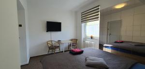 Postel nebo postele na pokoji v ubytování M-Tourist