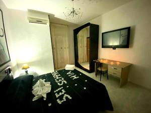 Łóżko lub łóżka w pokoju w obiekcie Hotel Napoleon-Cuore