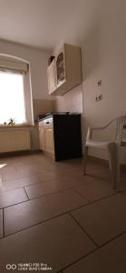 Kuchyň nebo kuchyňský kout v ubytování Monteurwohnung 1 Bitterfeld