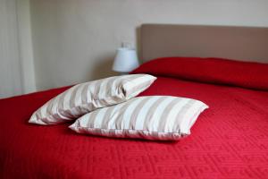 Postel nebo postele na pokoji v ubytování Relais Mevigo - Casa Padronale