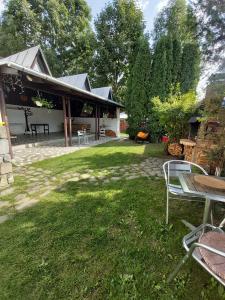 Zahrada ubytování Camere de inchiriat Cascada