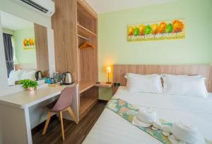 Postel nebo postele na pokoji v ubytování FLYPOD Hotel