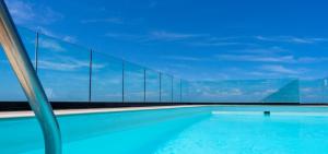 a swimming pool with a view of the sky at DWO Nopal in Puerto de la Cruz