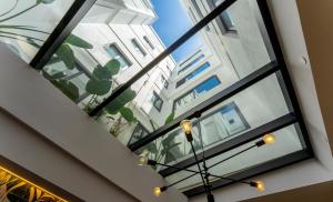 a large glass window in a building at DWO Nopal in Puerto de la Cruz