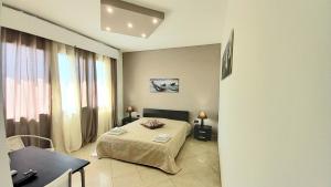 Postel nebo postele na pokoji v ubytování B&B Colori del Salento