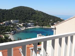 a view of a body of water from a balcony at Apartments Roko in Dubrovnik