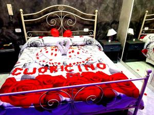 Łóżko lub łóżka w pokoju w obiekcie Hotel Napoleon-Cuore