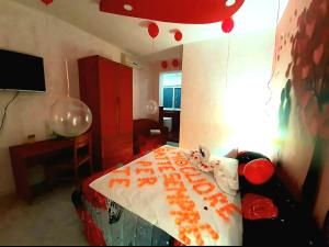 Telewizja i/lub zestaw kina domowego w obiekcie Hotel Napoleon-Cuore