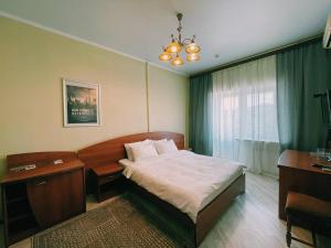 Кровать или кровати в номере Мини отель Астра