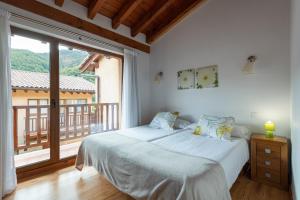 Postel nebo postele na pokoji v ubytování Apartamentos Bores