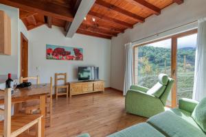 TV a/nebo společenská místnost v ubytování Apartamentos Bores