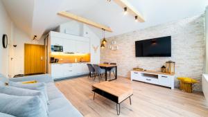 Kuchyňa alebo kuchynka v ubytovaní Apartamenty Sun & Snow Resort Karkonosze