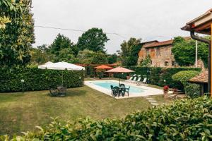 Bazén v ubytovaní Tenuta San Giovanni Lucca - Borgo del Locumone alebo v jeho blízkosti
