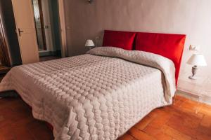 Posteľ alebo postele v izbe v ubytovaní Tenuta San Giovanni Lucca - Borgo del Locumone