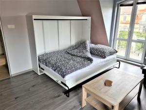 Posteľ alebo postele v izbe v ubytovaní Yakuzza Apartments