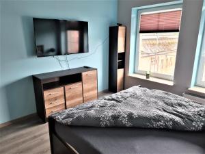 Posteľ alebo postele v izbe v ubytovaní Yakuzza Apartments
