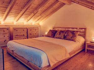 A bed or beds in a room at I Loft Viana