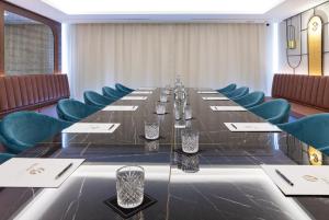 The business area and/or conference room at Nivia Born Boutique Hotel