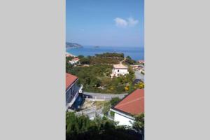 a view of the ocean from a building at Mansarda a Noli e Spotorno in Noli