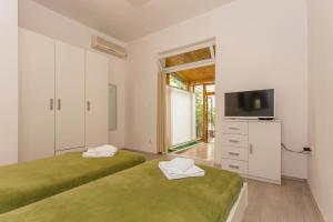 Fotografia z galérie ubytovania Comfortable modern studio with shaded patio v Splite