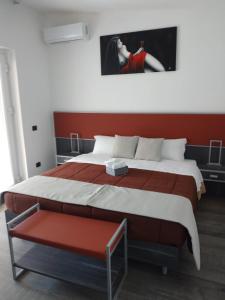 Postel nebo postele na pokoji v ubytování Rainbow Sweet Rooms