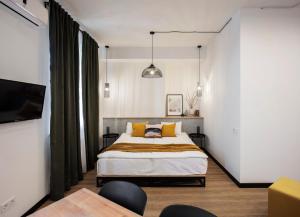Letto o letti in una camera di Kantar Hotel