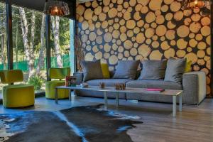 Posezení v ubytování Hotel Saint-Hubert