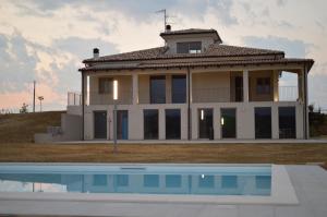The swimming pool at or close to RESORT REIS country house