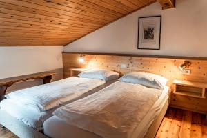 Postel nebo postele na pokoji v ubytování Residence Greymold