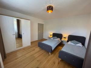 A bed or beds in a room at Apartment Ďumbier
