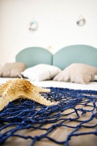 Postel nebo postele na pokoji v ubytování Hotel Embassy
