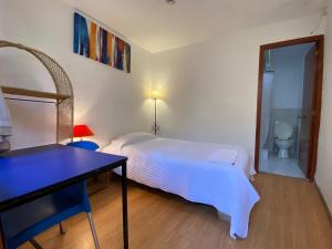 Letto o letti in una camera di Hostal Alcala