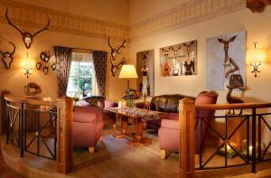 Posezení v ubytování Romantik Hotel Knippschild + 25 fotografií