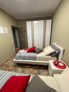 A bed or beds in a room at B&B Ares Castel Baronia