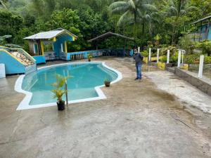 בריכת השחייה שנמצאת ב-Tapicoa Village Retreat או באזור