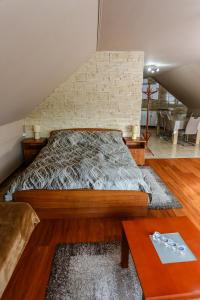Posteľ alebo postele v izbe v ubytovaní GÁRDI APARTMAN