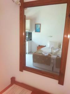 A bed or beds in a room at Villa Giorgos
