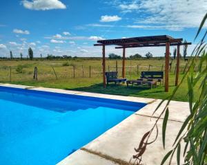 Piscina de la sau aproape de LOS TEROS POSADA DE CAMPO