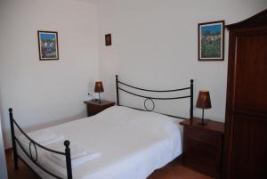 Кровать или кровати в номере Case Vacanze La Cernia Bruna