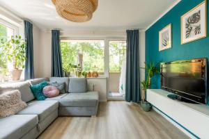 TV a/nebo společenská místnost v ubytování Sun House Apartment + free parking
