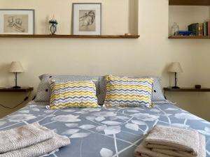 A bed or beds in a room at Casa Valdelagrana Playa