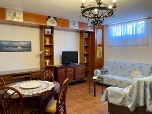 A television and/or entertainment centre at Casa Valdelagrana Playa