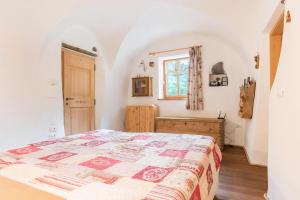 A bed or beds in a room at Maso La Marianna